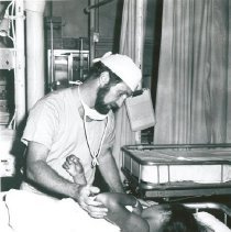 Dr Donald Mangus, Plastic Surgeon, with patient.